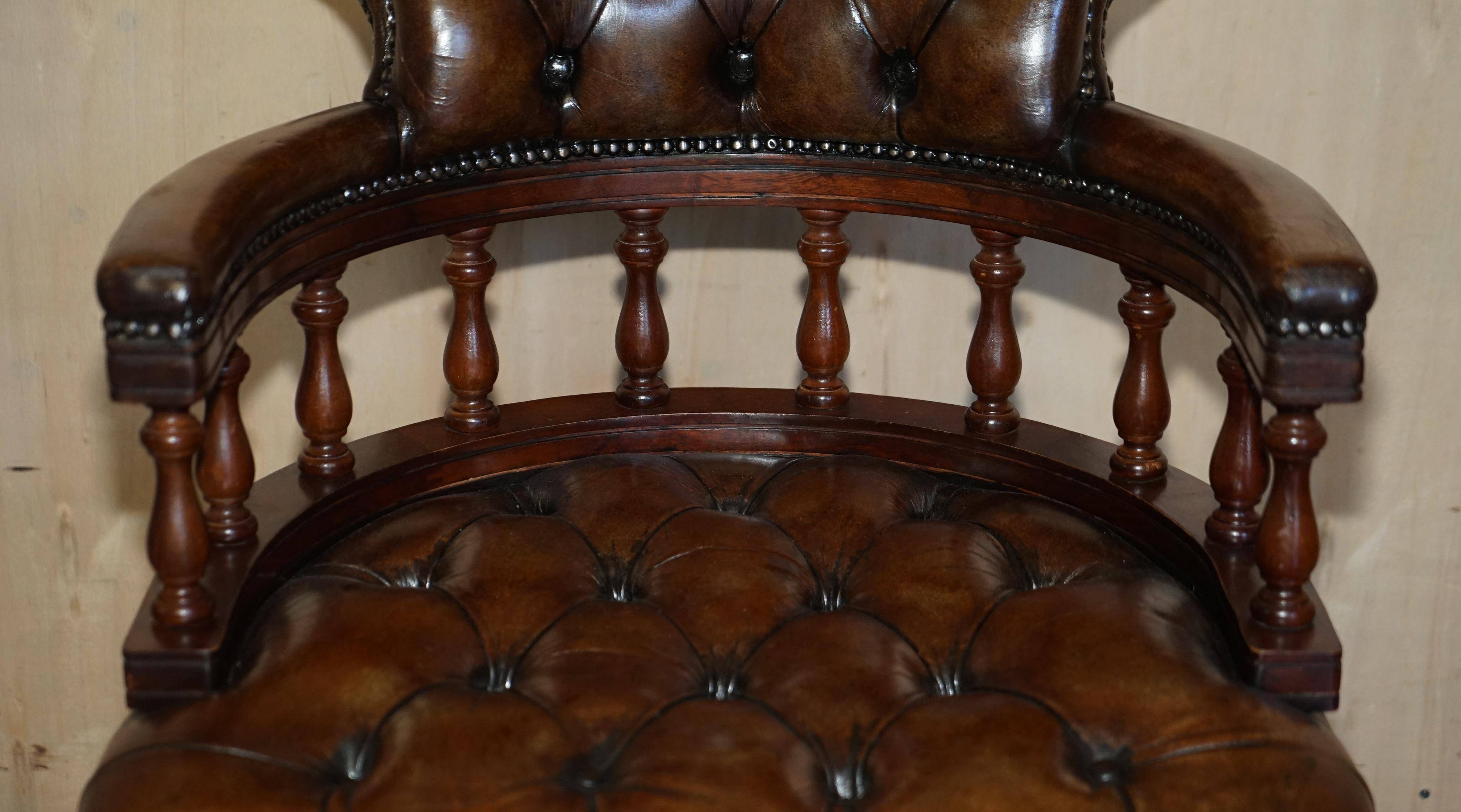 Vintage Chesterfield captain's chair in leather