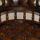 Vintage Chesterfield captain's chair in leather