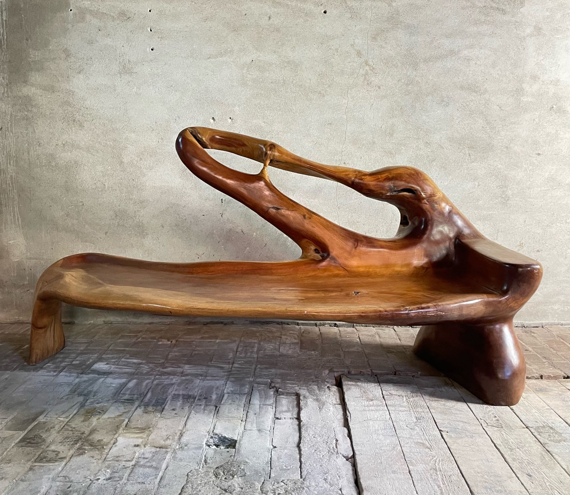 Sculptural solid wooden bench