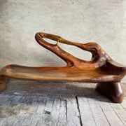 Sculptural bench in solid wood