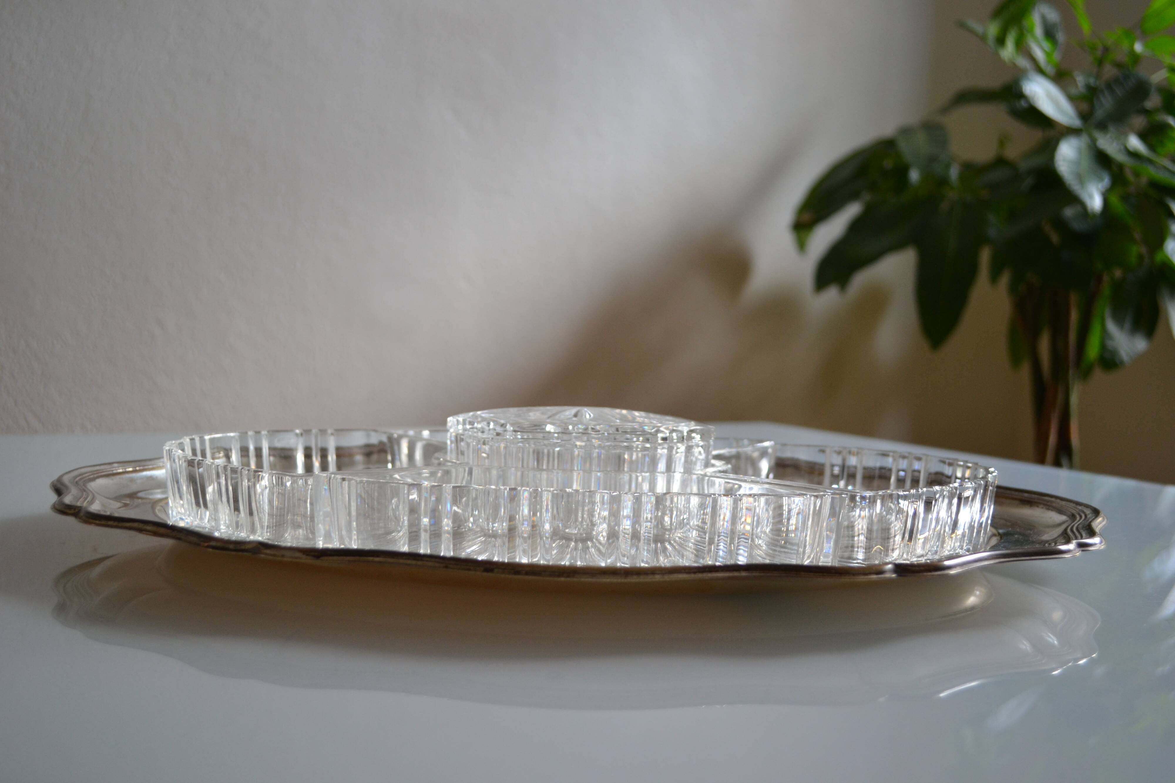 Silver-plated metal aperitif serving tray with HKE hallmark and glass.