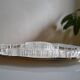 Silver-plated metal aperitif serving tray with HKE hallmark and glass.