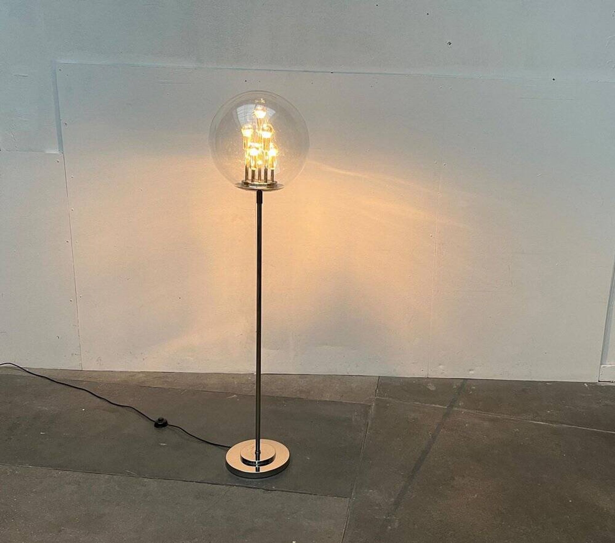 Spherical chrome and glass planetary floor lamp from the mid-century German space age by Doria Leuchten, 1960s.