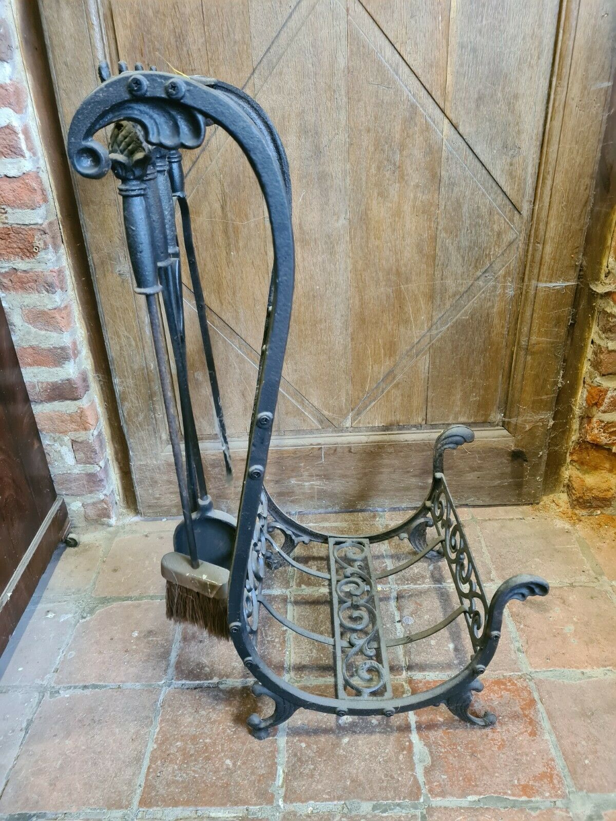 Fireplace, cast iron log holder