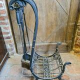 Fireplace, cast iron log holder