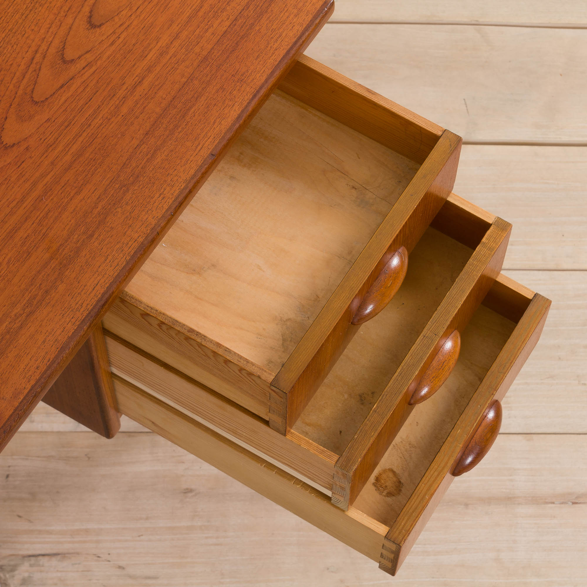 Danish mid century teak desk on sculptural base, 1960s.