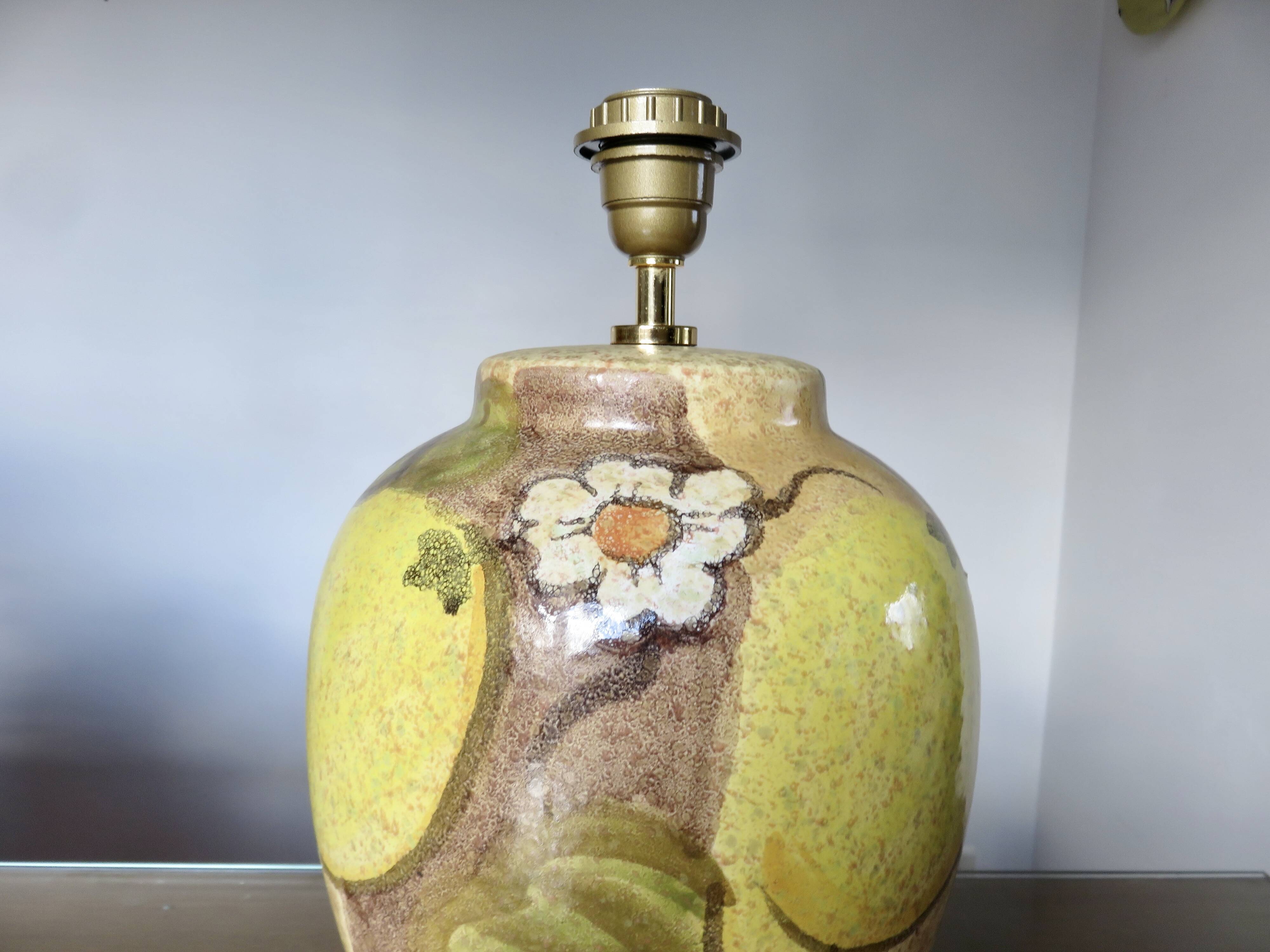 Hubert Olivier ceramic lamp with floral decoration, 1980.