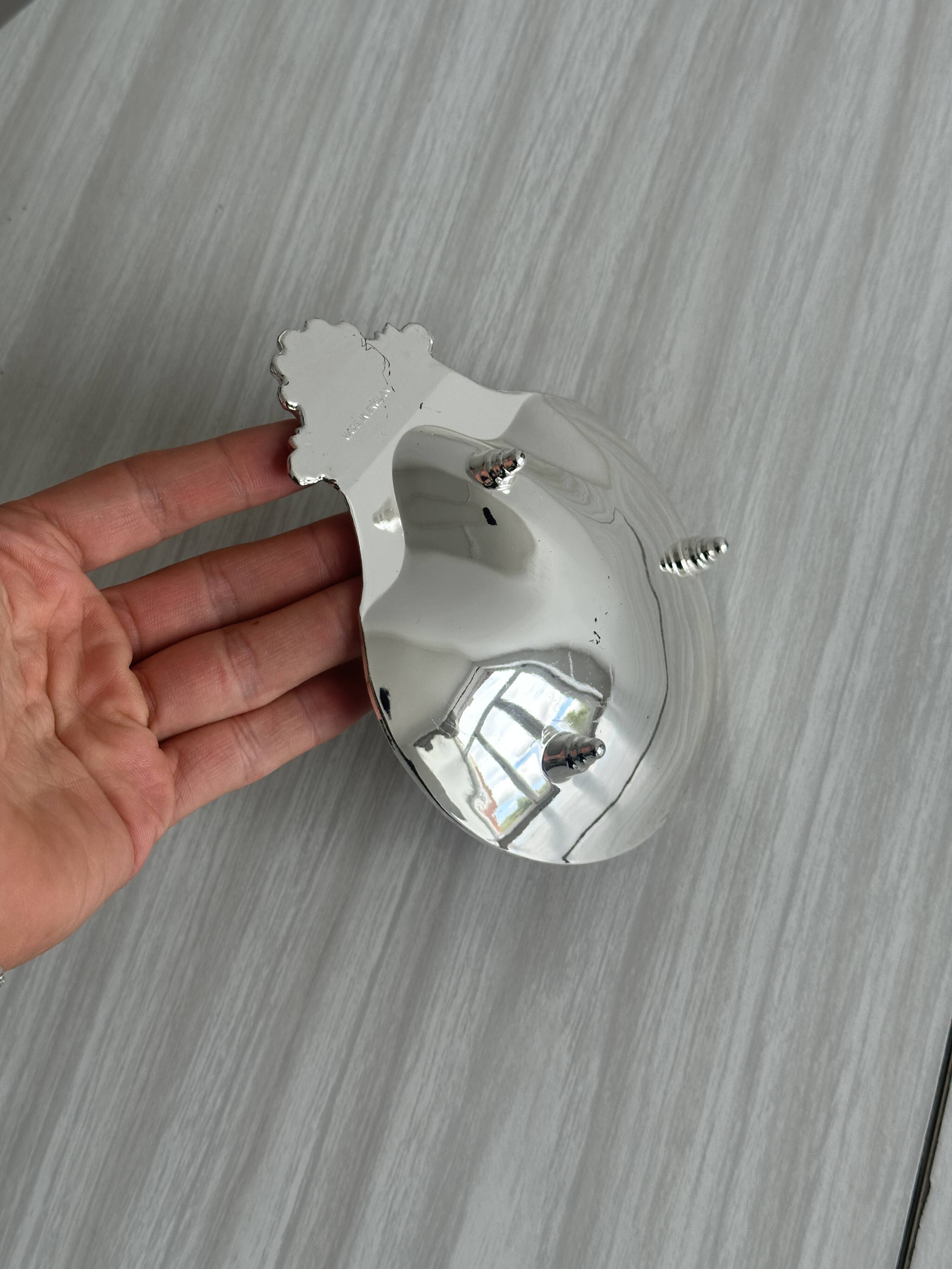 soap dish or jewelry holder in shiny metal