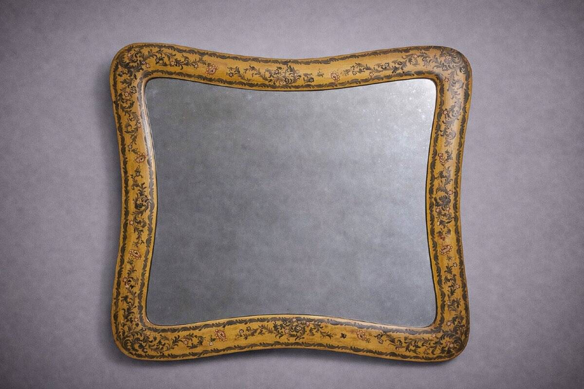 Important rectangular Venetian mirror with a richly painted wooden frame.