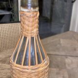 Bottle surrounded wicker