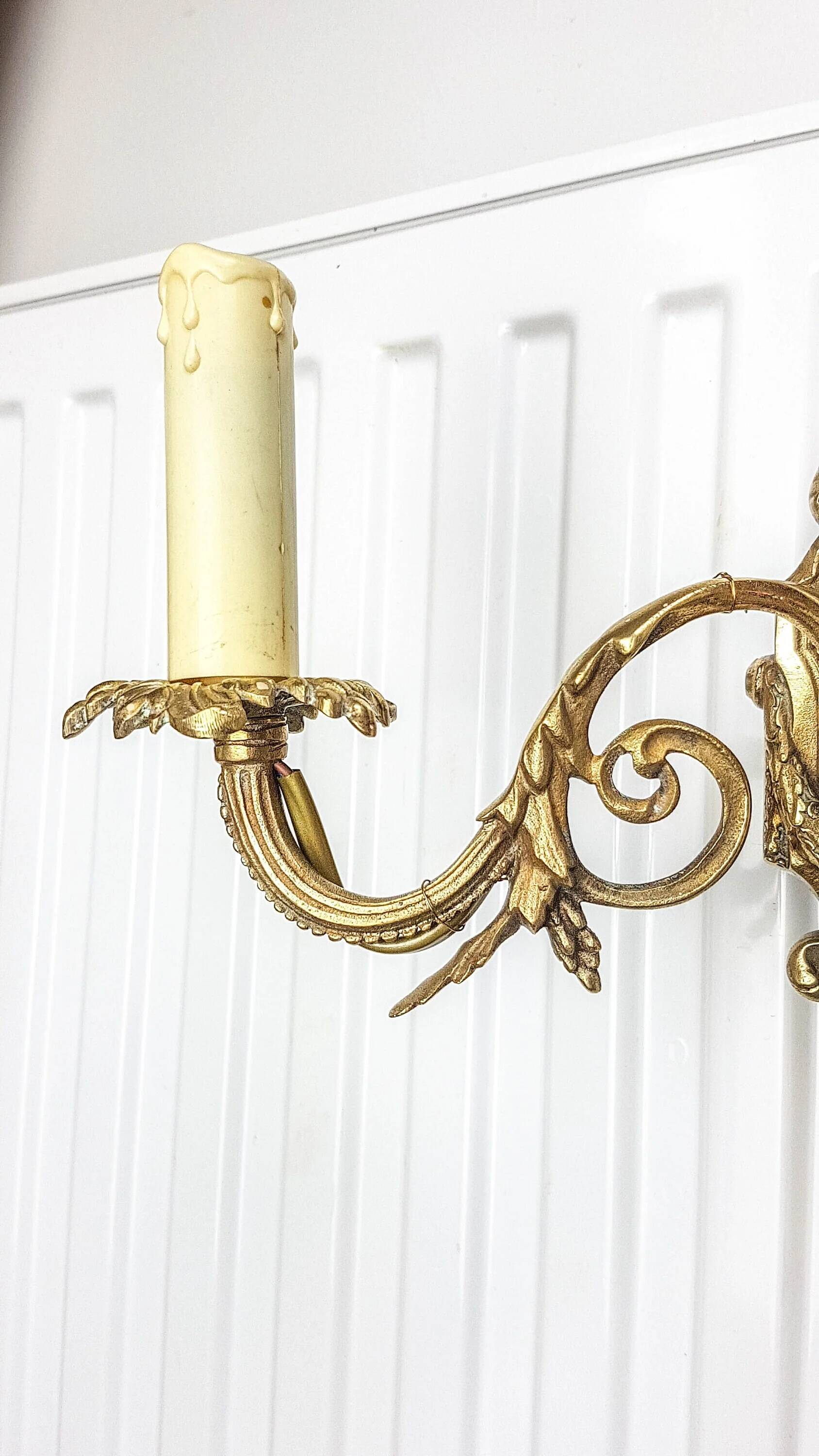 Bronze wall sconce in Empire style