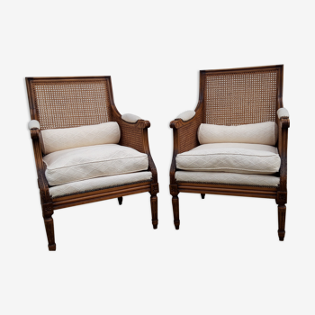 pair of Louis XVI armchairs canned.