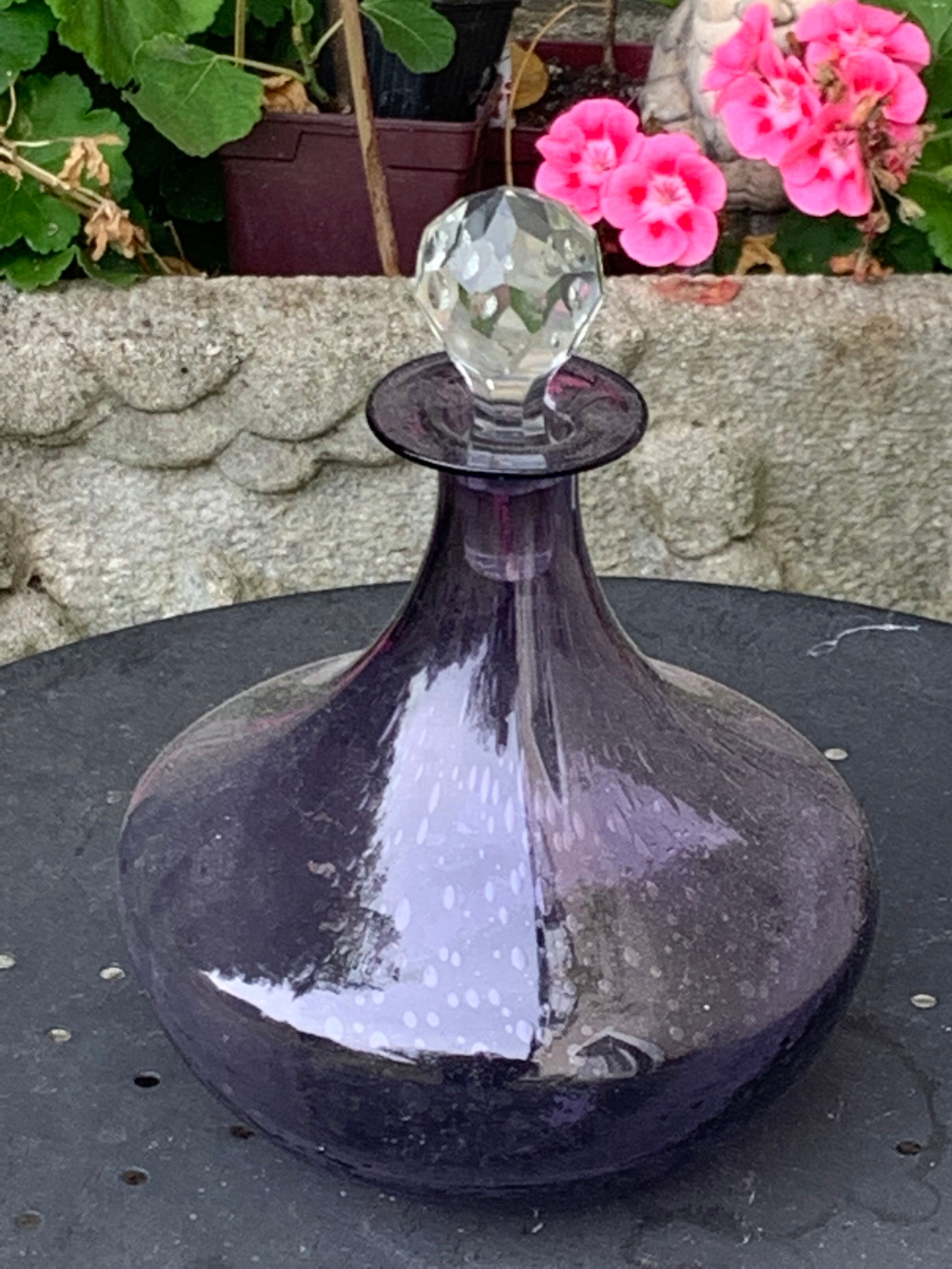 Bubble and purple blown glass decanter and faceted cut glass cap