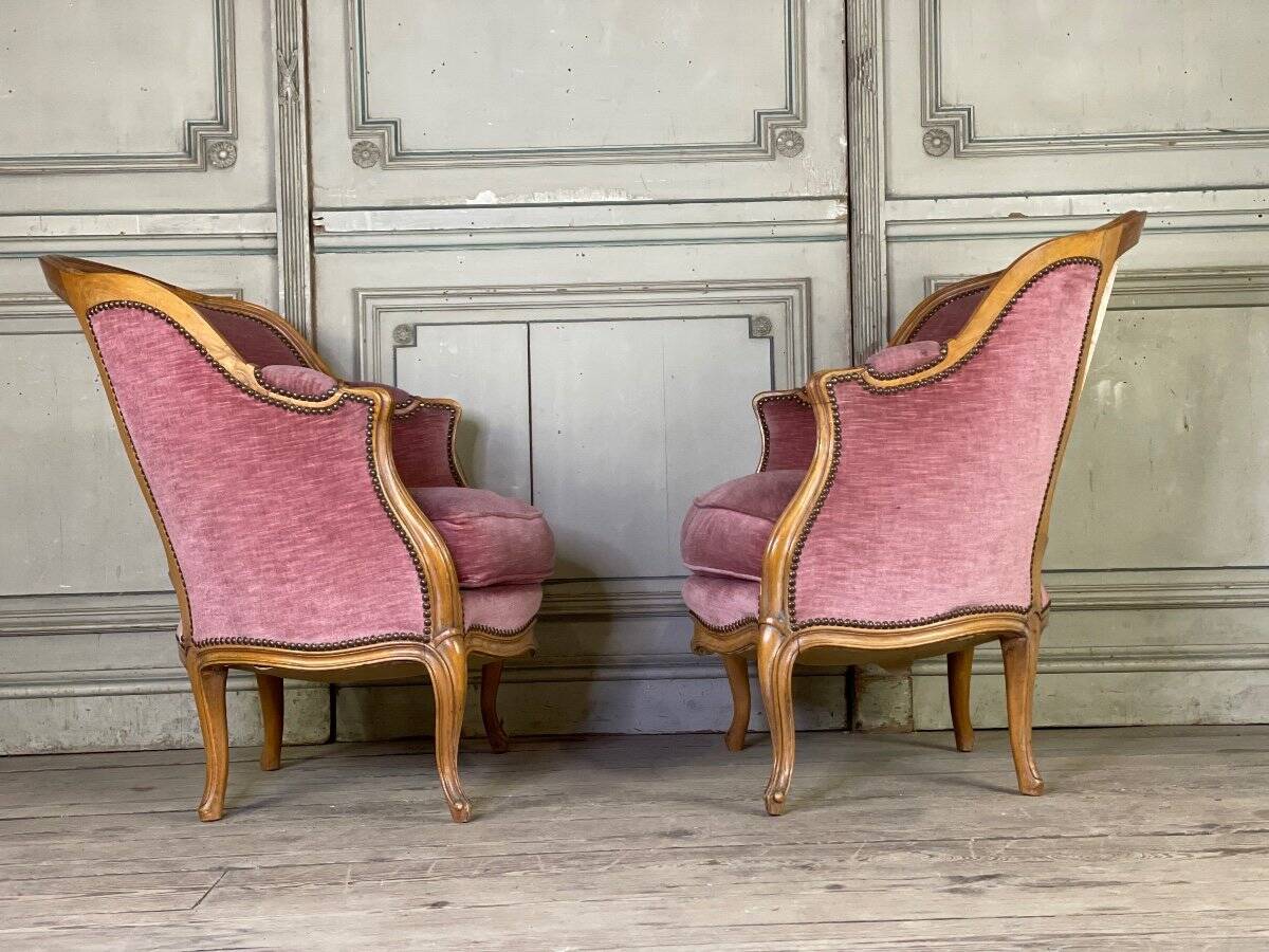 Pair of Louis XV style bergère armchairs in carved wood, pink velvet, circa 1900