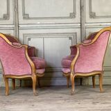 Pair of Louis XV style bergère armchairs in carved wood, pink velvet, circa 1900