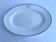 Antique oval plate with green monogram