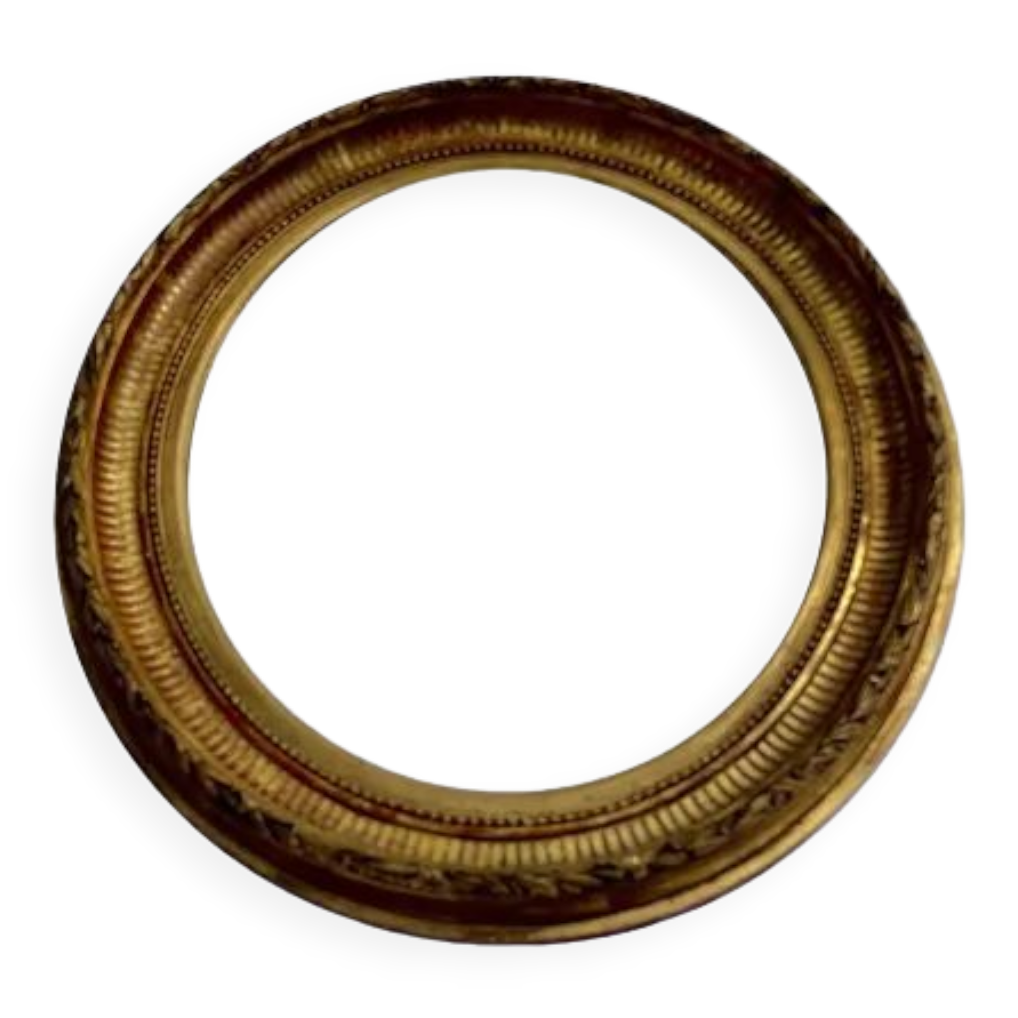 Oval wall mirror in gilded wood late nineteenth