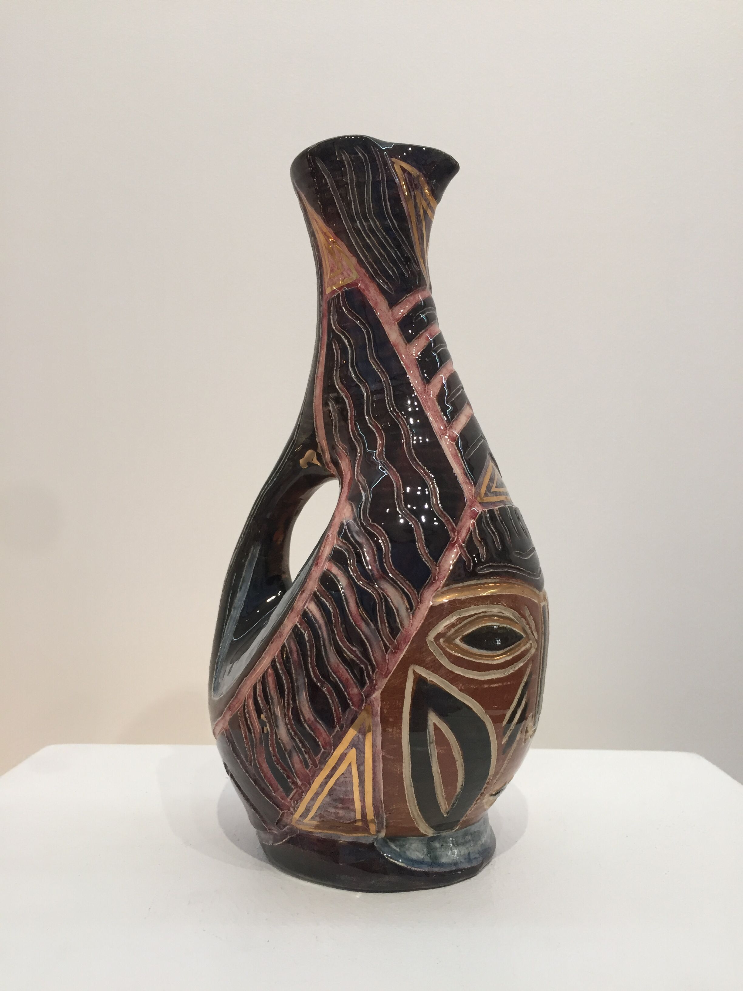 Large pitcher face decoration, signed ACCOLAY.