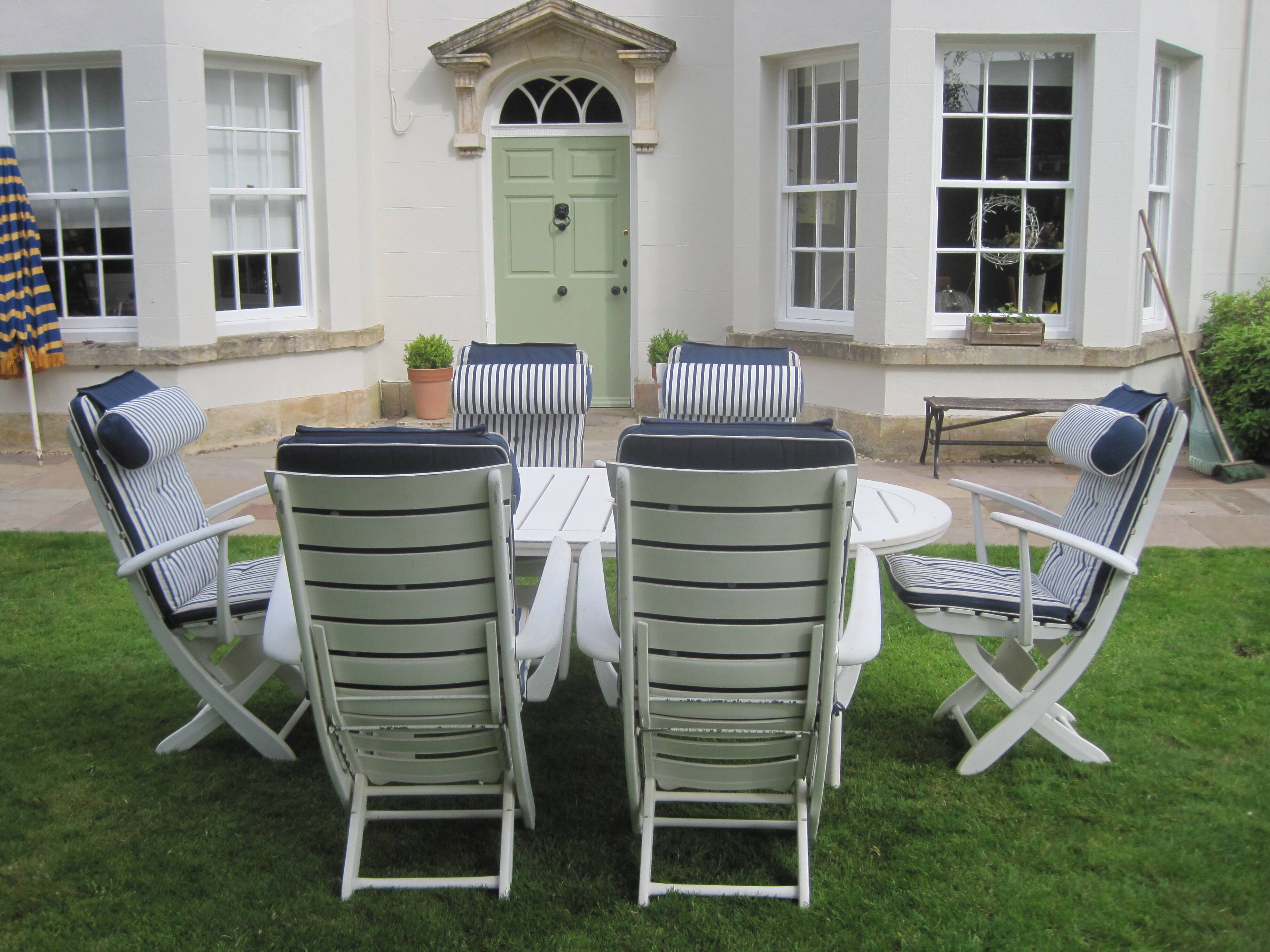 Mid-Century Riviera Chairs and Folding Table by French Maker Triconfort