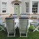 Mid-Century Riviera Chairs and Folding Table by French Maker Triconfort