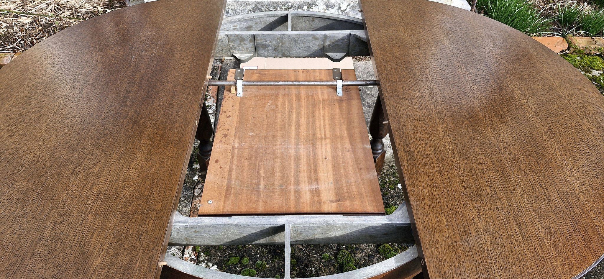 Round wooden table with 1 integrated extension + 6 wooden and fabric chairs