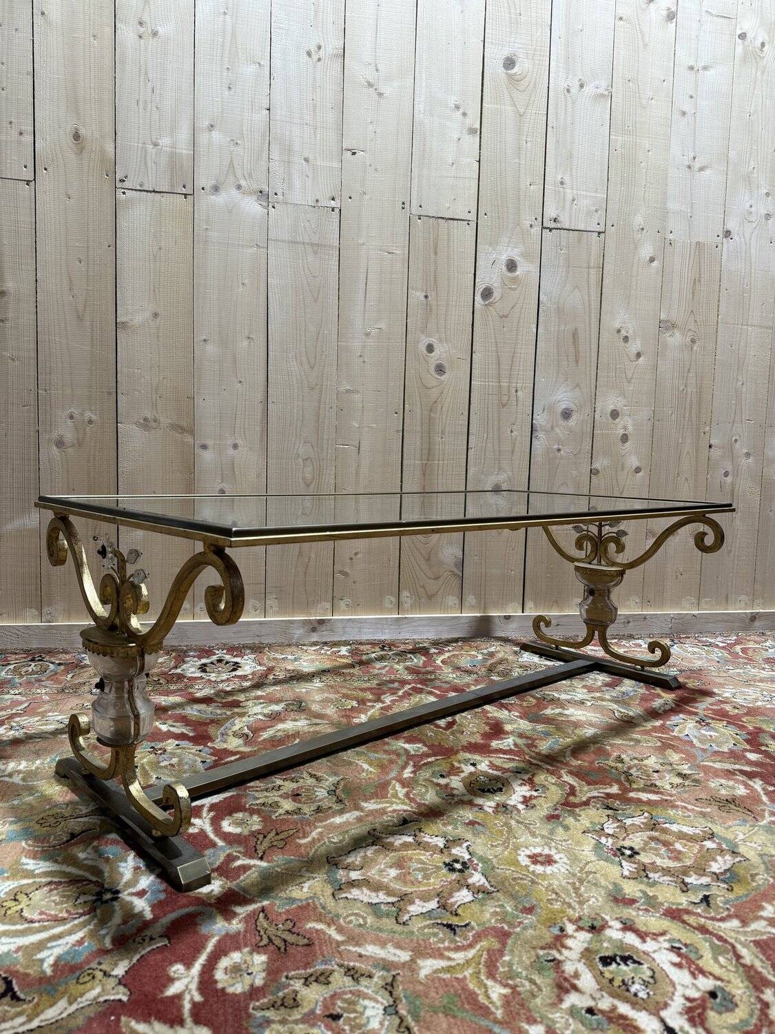 Gold metal and glass coffee table attributed to the BAGUÈS house.