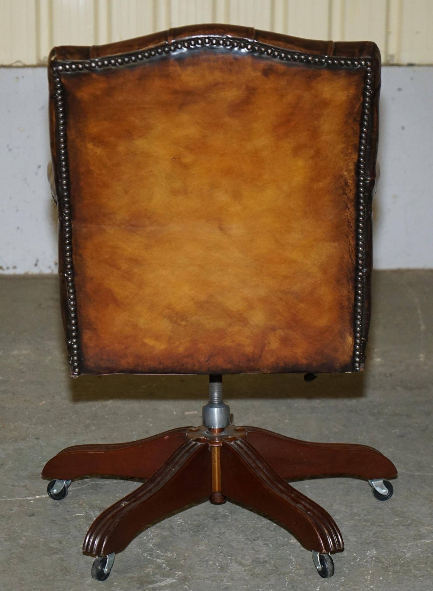 Restored leather captain's Chesterfield chair
