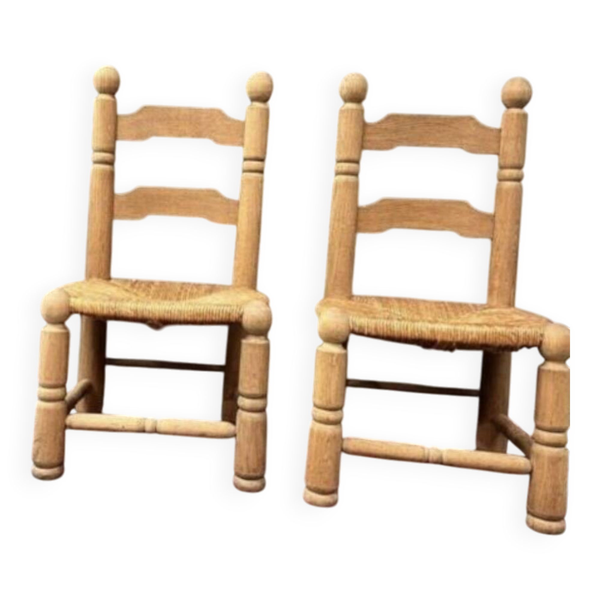 Pair of Dudouyt straw chairs