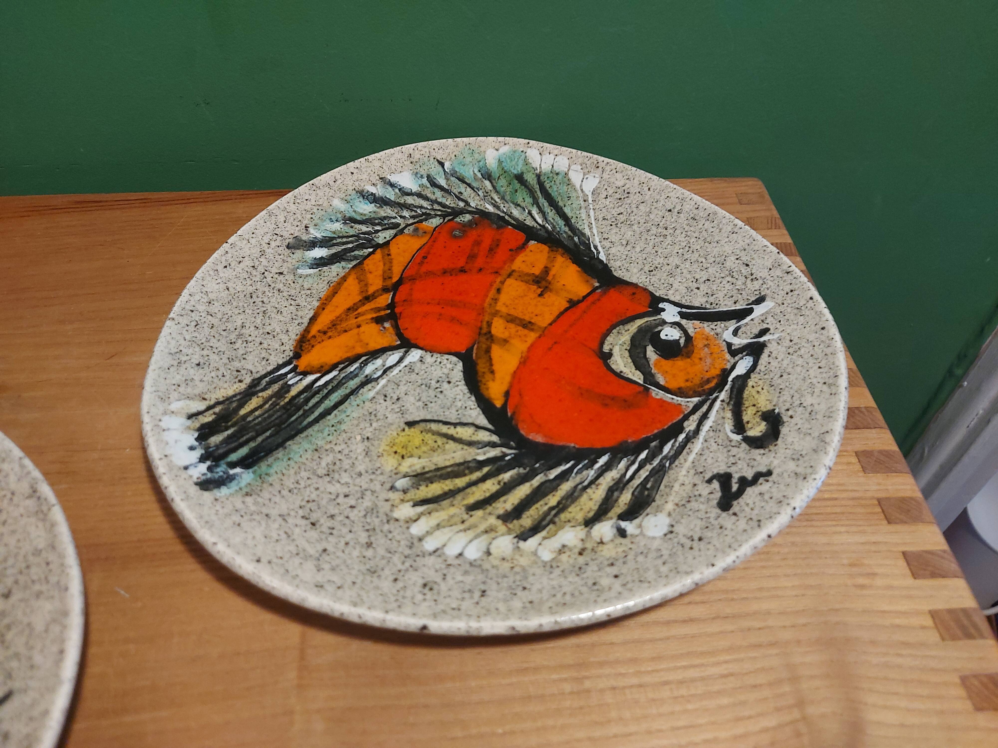 2 vintage ceramic plates with fish decoration
