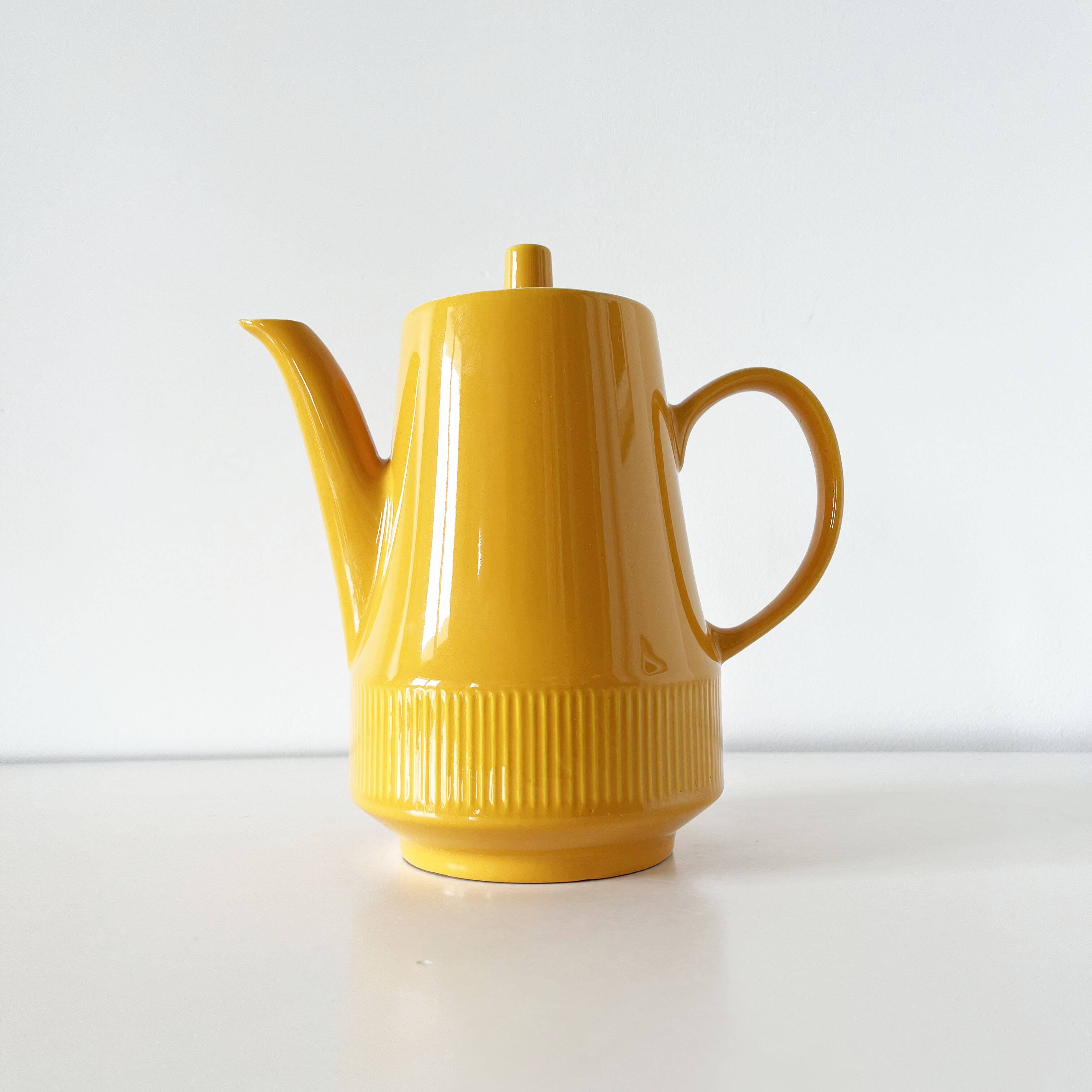 Old yellow ceramic coffee or teapot 1960