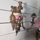 Wall light with 3 flames in bronze and porcelain in Louis XVI style.