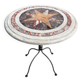 Round marble table with marble inlay
