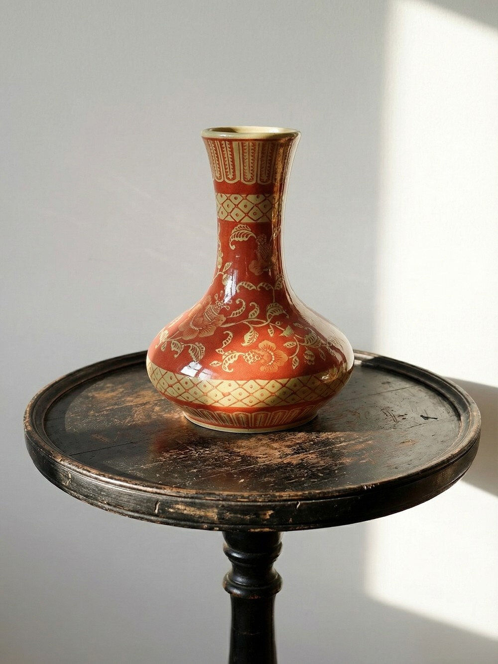 20th century Chinese vase, hand-painted ceramic in an unusual red hue.