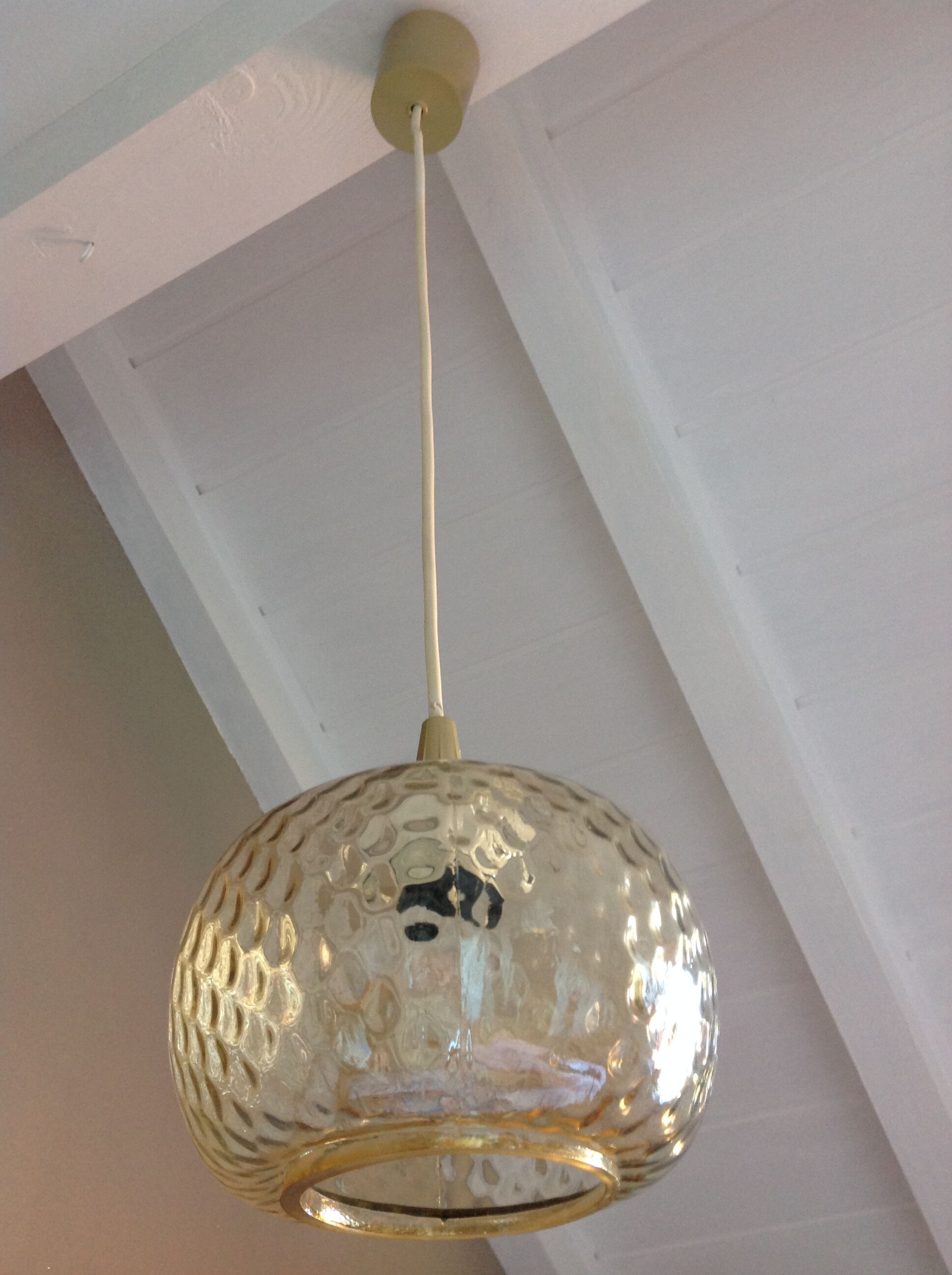 Globe pendant lamp in bubbled amber glass / vintage 60s-70s