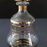 Glass liquor carafe decorated with gilded borders