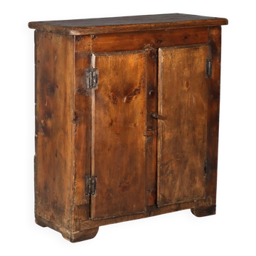Antique pine wardrobe painted in walnut stain, restorations, Italy, 17th century.