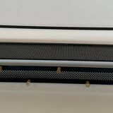 Coat rack in black lacquered metal, perforated sheet metal and brass in the style of Mathieu Matégot