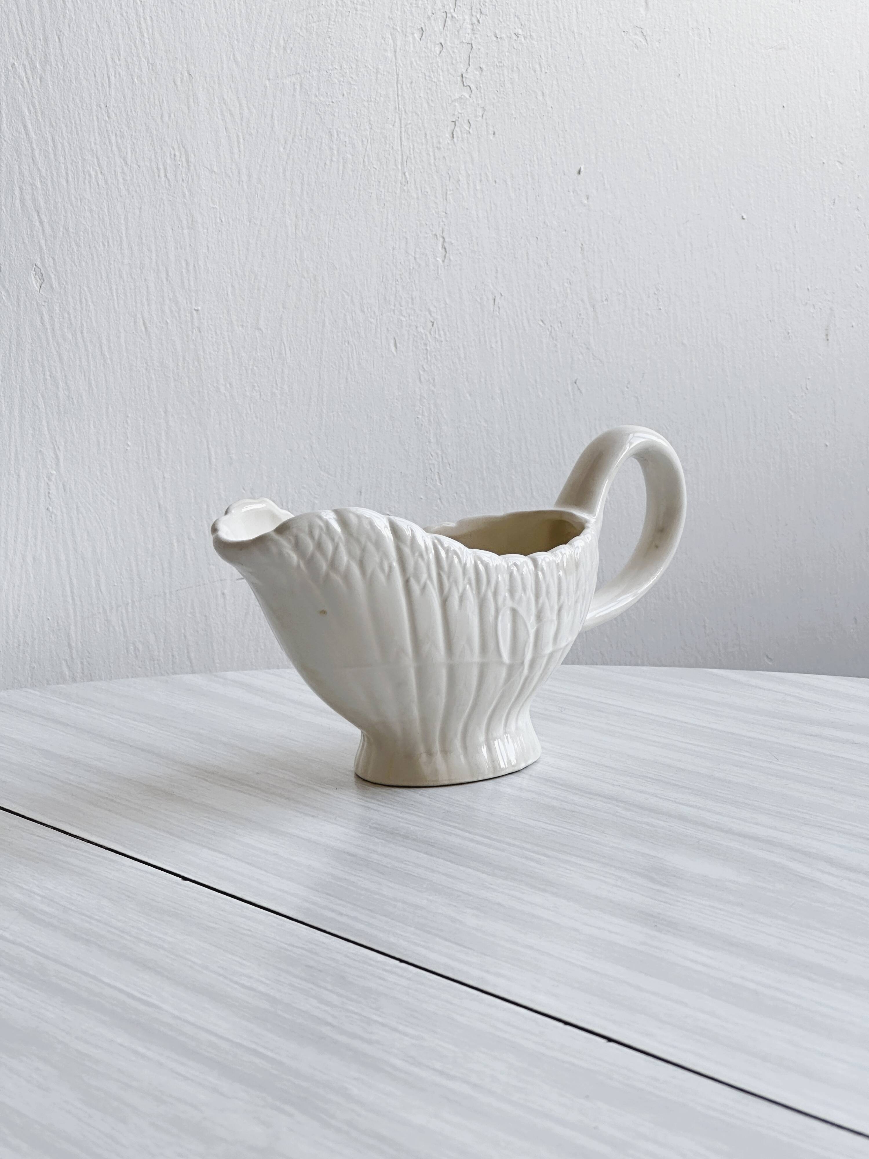 White asparagus slushy gravy boat.