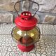 Vintage round glass and metal storm lamp