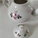Porcelain teapot with rose patterns