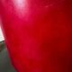 Vintage red table lamp with glass base