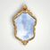 Miroir style Rocaille en plâtre doré, vers 1950
