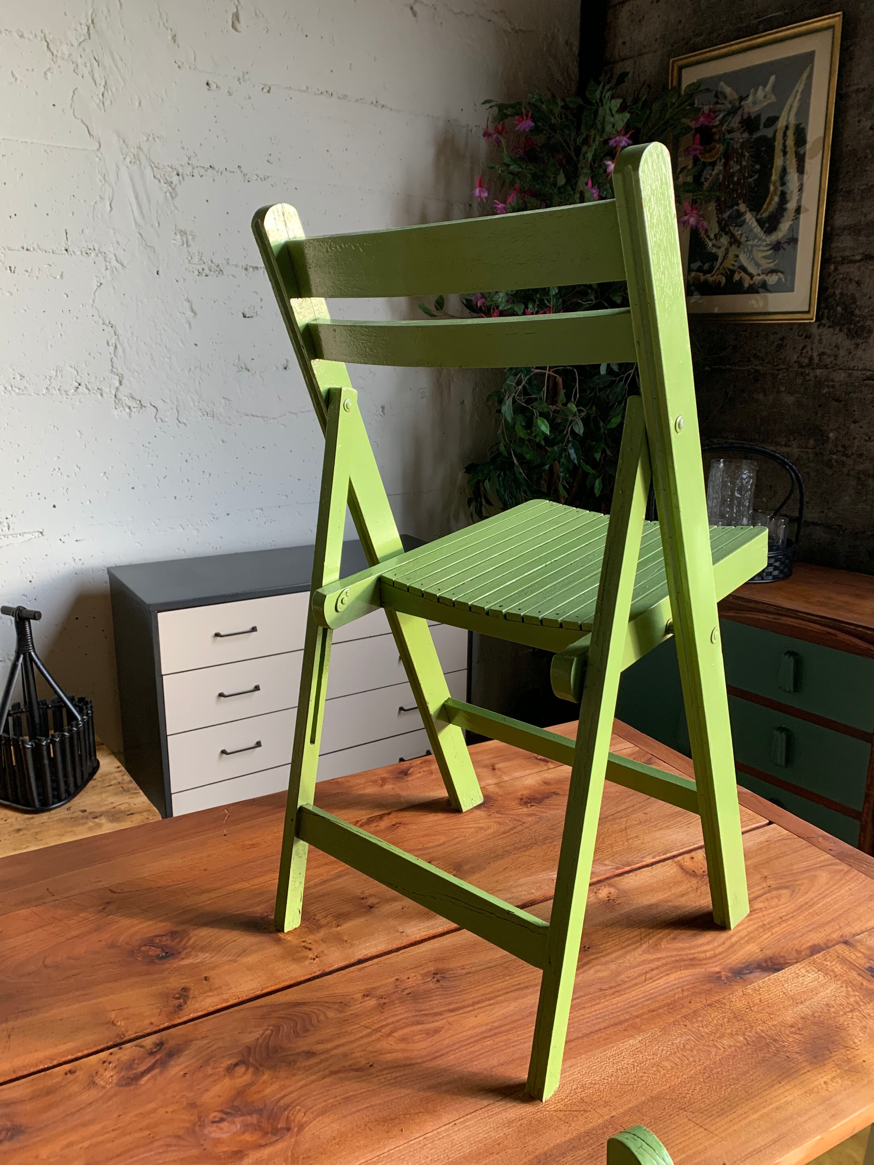 3 wooden folding chairs
