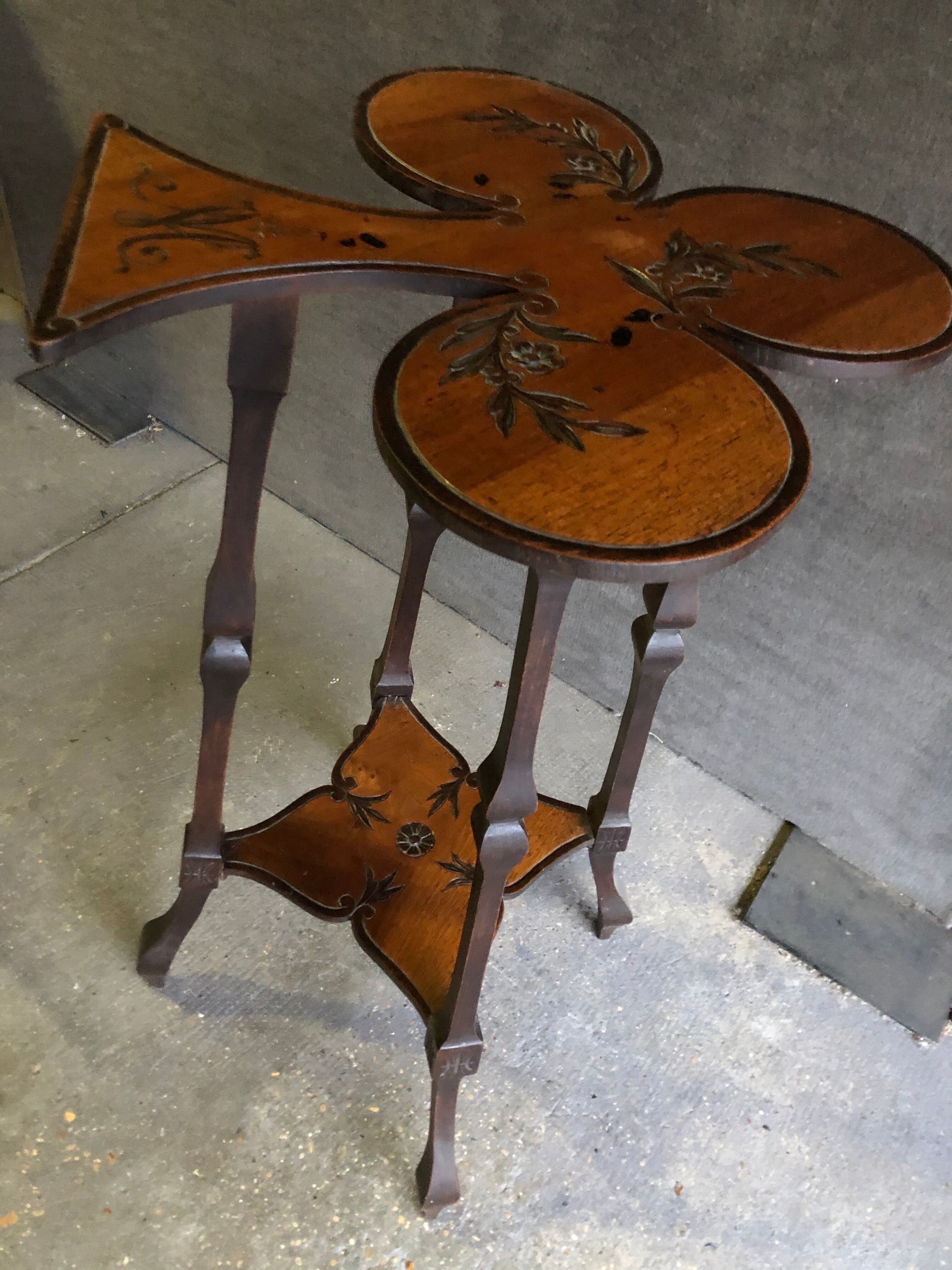 Art nouveau table with a pyrograved decoration
