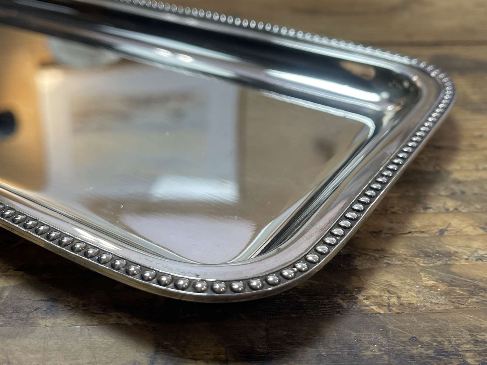 Small rectangular and beaded silver metal top