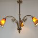 Lustre 3 feux Art Nouveau en bronze avec abat-jour en verre orange et vert, France