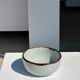 Small white glazed ceramic bowl black edges