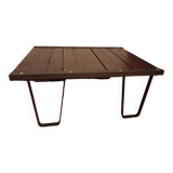 Raw wood and wrought iron coffee table