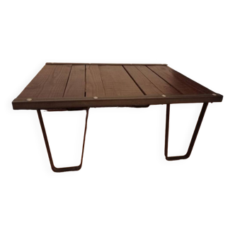 Raw wood and wrought iron coffee table