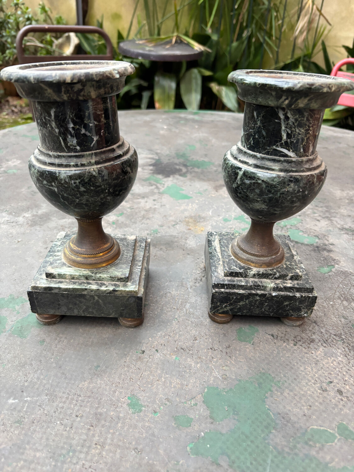Pair of green marble vases